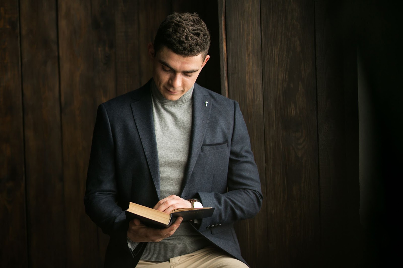 man in church reading the bible